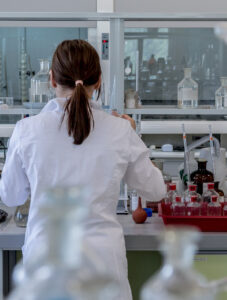 a woman working in a laboratory